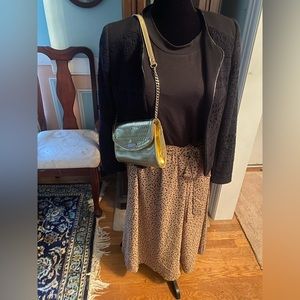 Zatcass Dress with animal print and black , short sleeves on the top, NWOT, sz L